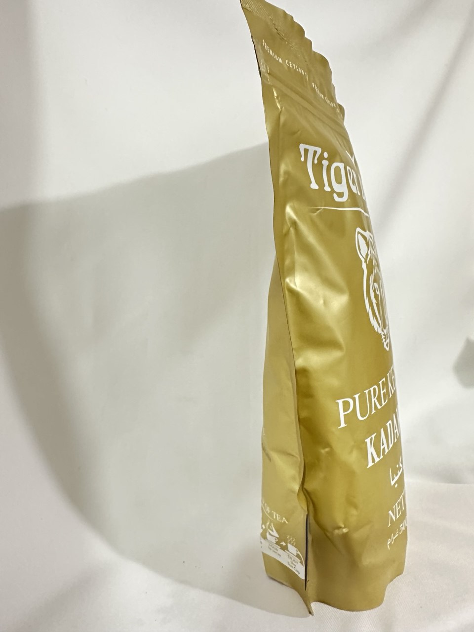 Kenya Tiger Black Tea 500g – چای سیاه کنیا تایگر با رنگ طبیعی و طعم تند و دلچسب، محصول ممتاز از مزارع کنیا | بهترین چای خارجی مخصوص عاشقان طعم قوی ، فروشگاه آنلاین شکلاد